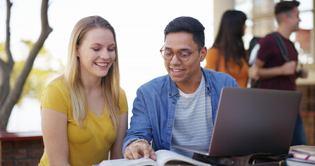 Students, book and learning with laptop on campus for exam study, test preparation or education....