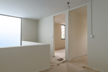 Hopeful interior view of house renovation during construction phase. close up architectural detail of new room showing progress on home remodeling project