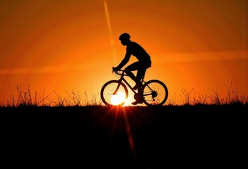 Obraz premium Silhouette of a Cyclist Riding a Bicycle at Sunset with Vibrant Orange Sky and Sunlight Creating a Stunning Backdrop on a Grassy Terrain