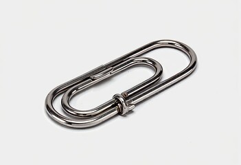 Naklejka premium Close-up of a double oval metal paperclip on a plain background showcasing minimalist industrial design and office stationery utility