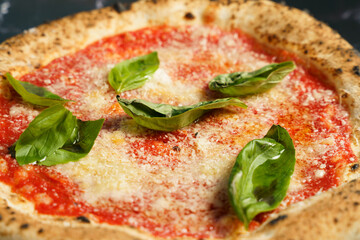 Traditional margherita pizza with fresh basil