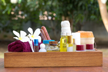 Spa treatment aroma therapy, towels, soap, candles and massage tools.