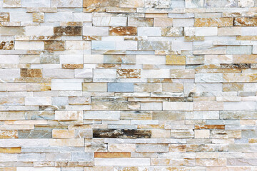 Natural stone texture in top view, arranged in horizontal strip row layers resembling brick pattern. Soft beige color tones, look clean and modern. Ideal for background, material mapping texture.
