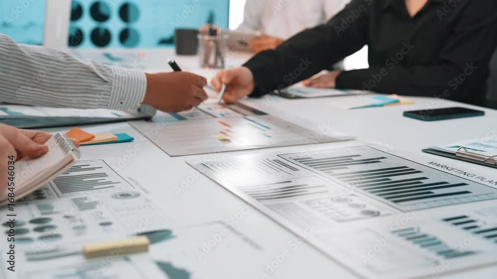 Aufkleber a dynamic business team engaged in collaborative planning and strategy development using data analys