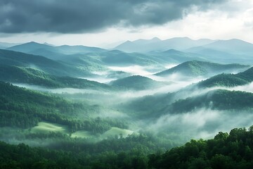 Serene Misty Mountain Landscape: Lush Green Hills and Rolling Fog at Dawn