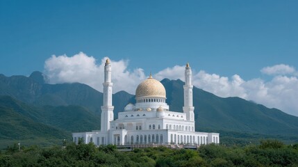 Obraz premium Majestic Mosque Set Against a Stunning Mountain Landscape with Clear Blue Sky and Lush Greenery, Ideal for Travel and Architecture Themes