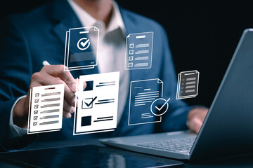Business performance monitoring concept, businessman using tablet and laptop Online survey filling out, digital form checklist