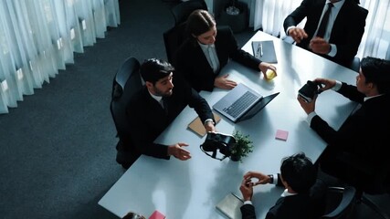 Top view of manager working on laptop and sending data analysis to business people by using VR glass headset while diverse team moving gesture while working together to planning idea. Directorate. - Powered by Adobe