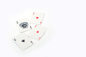 Four aces playing cards isolated on white background