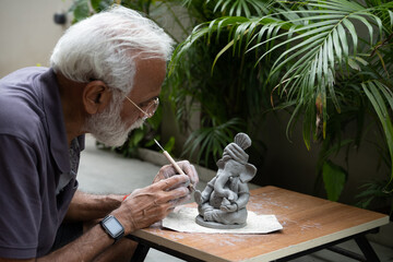 Eco friendly Ganesh Ganpati idol or murti, home made. 