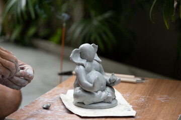 Eco friendly Ganesh Ganpati idol or murti, home made. 