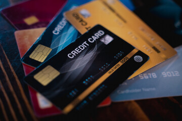 Customer using credit card for payment to owner business. cashless technology and credit card payment concept. through the internet for convenience.