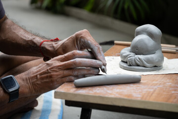  crafting an eco-friendly clay Ganesh idol for Ganesh Chaturthi 
