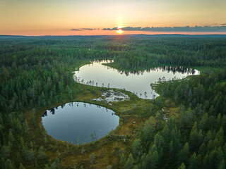 sunset over lakes and forest
