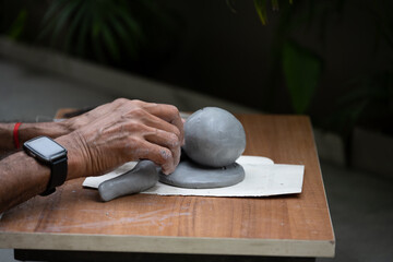  crafting an eco-friendly clay Ganesh idol for Ganesh Chaturthi 
