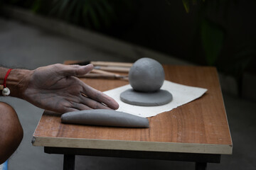  crafting an eco-friendly clay Ganesh idol for Ganesh Chaturthi 
