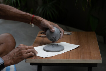  crafting an eco-friendly clay Ganesh idol for Ganesh Chaturthi 
