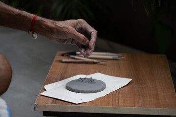  crafting an eco-friendly clay Ganesh idol for Ganesh Chaturthi 
