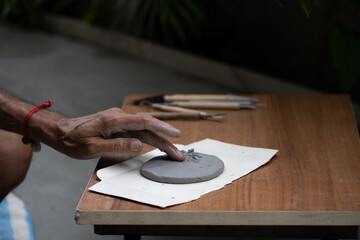  crafting an eco-friendly clay Ganesh idol for Ganesh Chaturthi 
