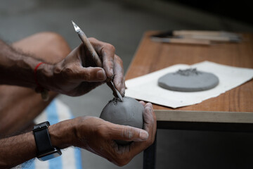  crafting an eco-friendly clay Ganesh idol for Ganesh Chaturthi 
