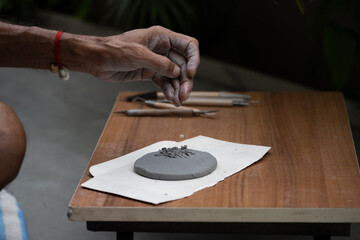  crafting an eco-friendly clay Ganesh idol for Ganesh Chaturthi 
