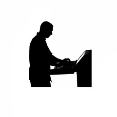 Silhouette of a technician programming a cnc machine panel