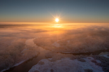 Sunrise Over Foggy River Landscape