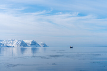 Solitary Boat on Calm Arctic Waters