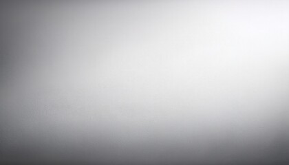 A simple, smooth gray and white gradient background with a soft light source from the top right corner.