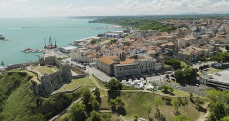 Aerial view of Castello Aragonese, boats in the harbor, and the city of Ortona blending old and new architecture, Ortona, Abruzzo, Italy.