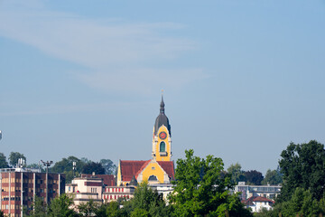 Scenic landscape with bell tower of Gerliswil church at Swiss city of Emmen on a sunny summer day....