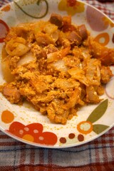 Homemade Hungarian vegetable stew, lecsó, served in a bowl, close-up view.