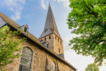 Historic Church Tower Against Blue Sky in Hattingen Germany