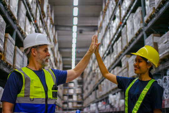 Logistics employees are working warehouse.