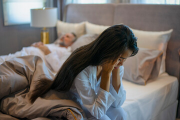 Couple is fighting in bedroom.