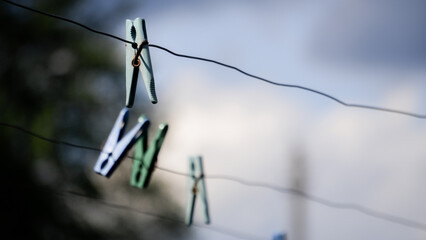 barbed wire against blue sky