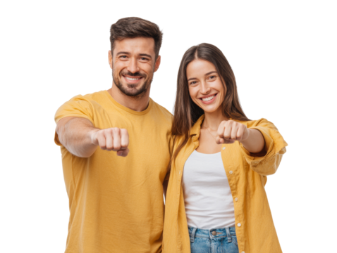 Cheerful young couple extending fists forward with smiles on a transparent space