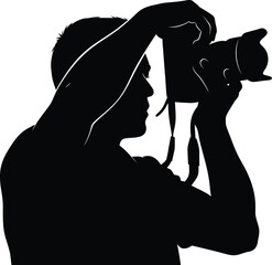 Silhouette of a photographer taking a picture, capturing a moment in time with passion and creativity