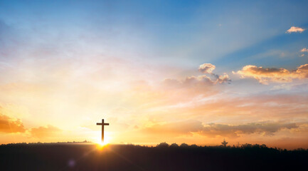 Christian cross on sunset sky background. Christian cross on sunset sky background
