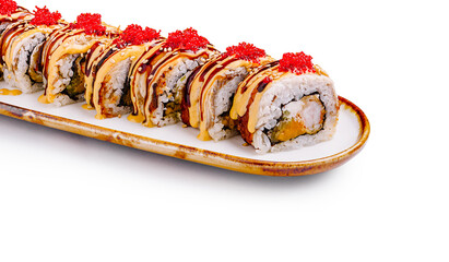 Sushi rolls plated beautifully with vibrant toppings at a restaurant