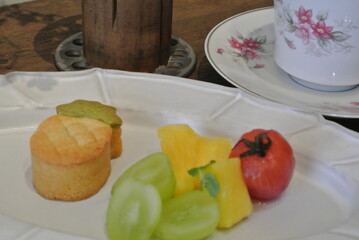 chinese afternoon tea with cake and fruit