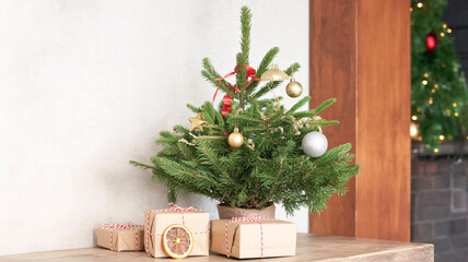 Cozy Christmas tree with gifts and warm holiday lights evokes festive cheer and joyful anticipation