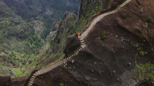 Above View Of A Hiker At Pico do Arieiro In Madeira, Portugal. Aerial Topdown Shot