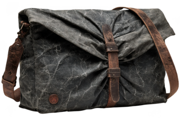 Distressed grey canvas messenger bag with leather accents isolated on transparent background