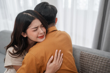 A truly heartfelt moment showcasing support and comfort beautifully captured in a cozy setting