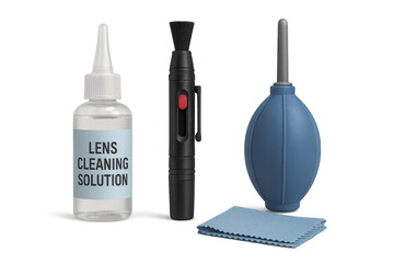 Lens cleaning kit with solution, brush, blower, and cloth on transparent background