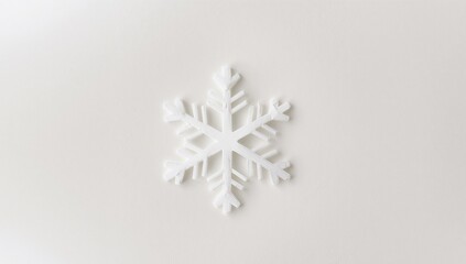 White Snowflake Ornament on White Background, a Symbol of Winter and Christmas.