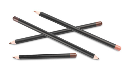 crossed brown eyeliner pencils for makeup concepts