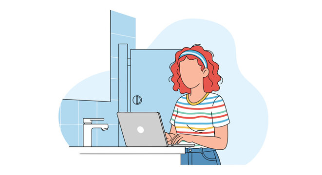 Young woman with curly red hair works on her laptop at a bathroom vanity, symbolizing remote work flexibility and modern, adaptable lifestyle.