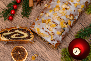 Christmas background, Christmas Eve cake, traditional poppy seed cake surrounded by decorations on the Christmas table